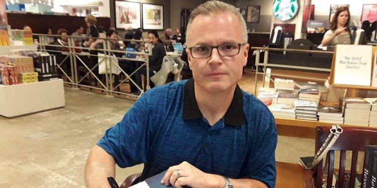 Jeff Emmerson signing books