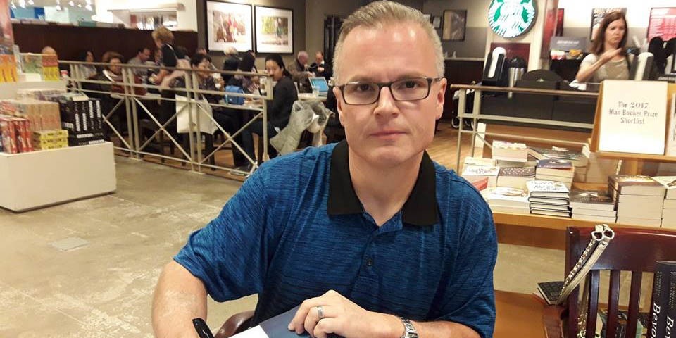 Jeff Emmerson signing books
